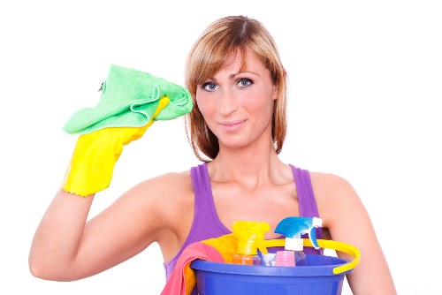 Technician preparing carpet cleaning equipment safely