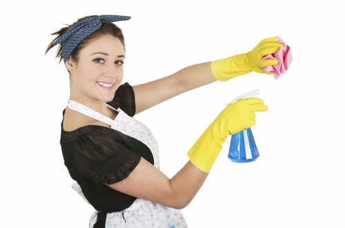 Cleaner using protective gear during carpet cleaning